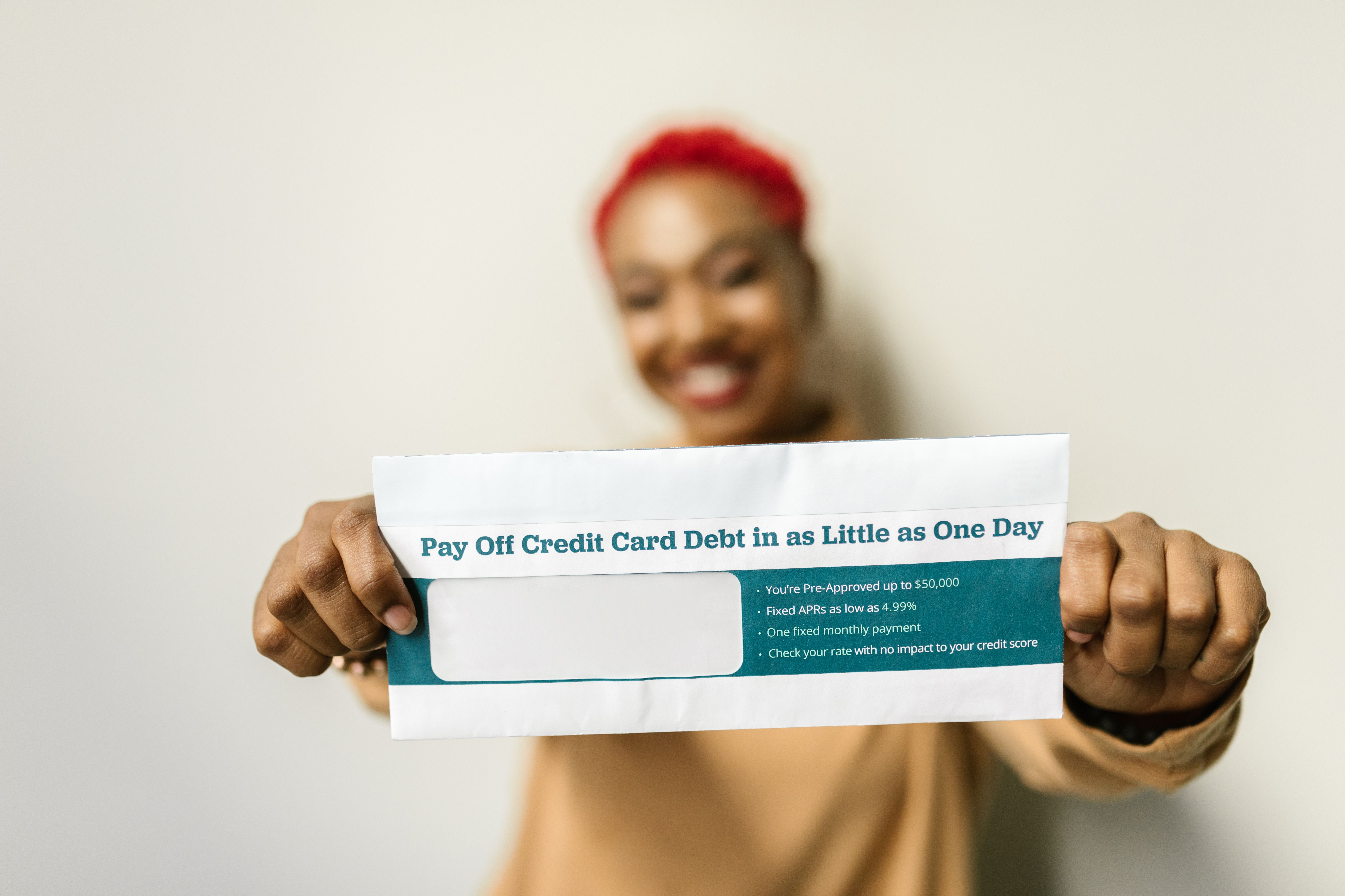 Infographic showing credit card debt moving to a new 0% APR card, illustrating interest savings.