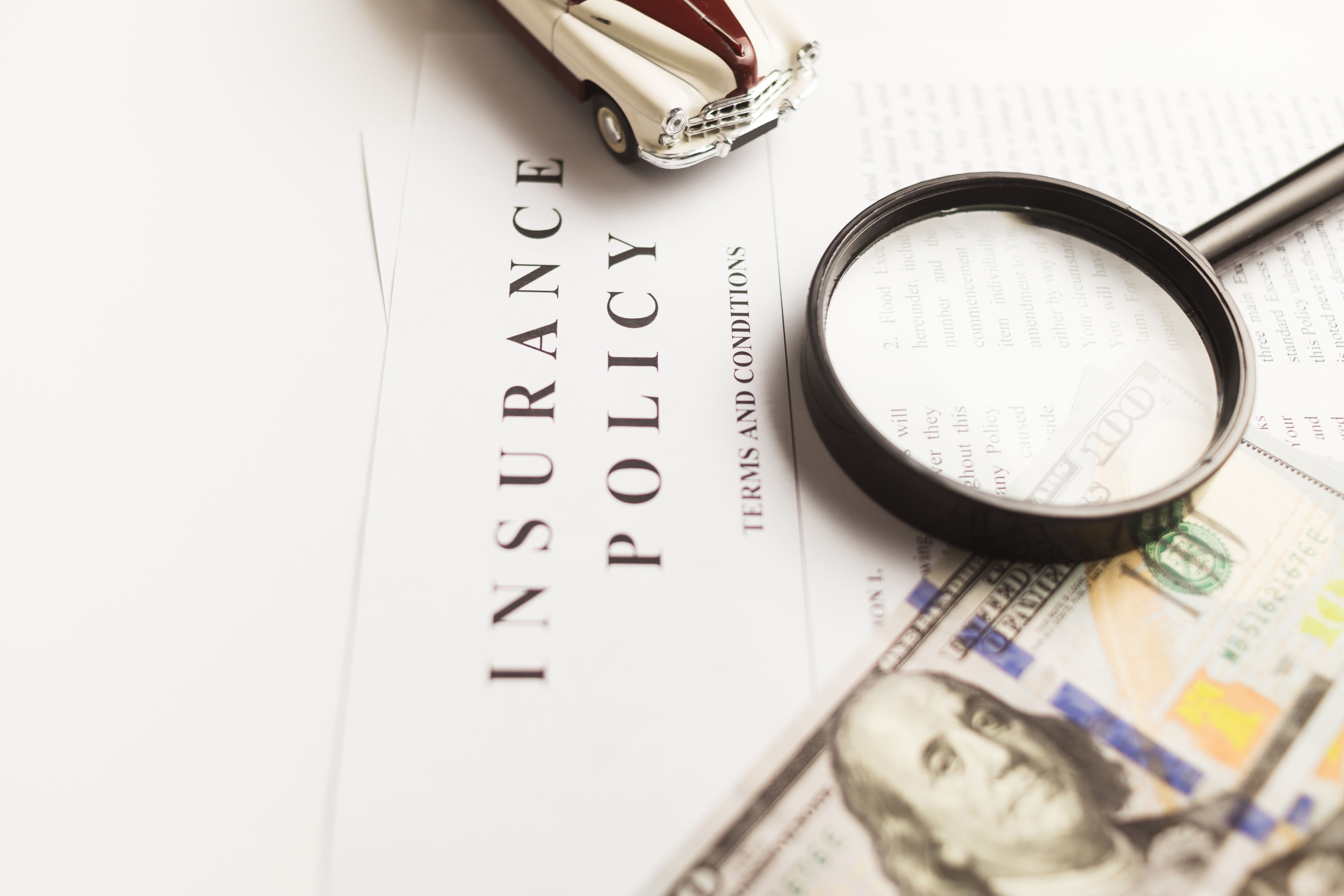 Infographic showing various factors influencing car insurance premiums.